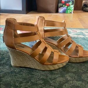 Worn brown wedges